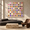 Colorful Dry Brush Dot Grid Painting shown in a living room with a sofa.