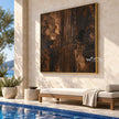 Copper and Charcoal Abstract with Center Stripes shown above a long pale bench.