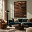 Copper Brown Layered Ridge Wall Art shown above a dark green sofa.