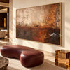 Copper Haze Abstract Canvas Art shown in a seating area.