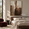 Cream and Brown Intersecting Blocks Wall Art shown above a bed with neutral bedding.