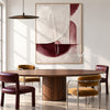 Cream and Burgundy Half Circle Painting shown in a dining area.