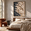 Cream and Charcoal Layered Forms Wall Art shown above a bed with neutral bedding.