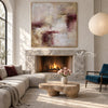 Cream and Plum Weathered Abstract Painting shown near a fireplace.