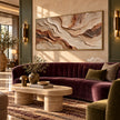 Cream and Rust Contour Panorama Wall Art shown above a burgundy sofa.