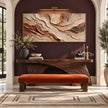 Cream and Rust Contour Panorama Wall Art shown above a console and orange bench.