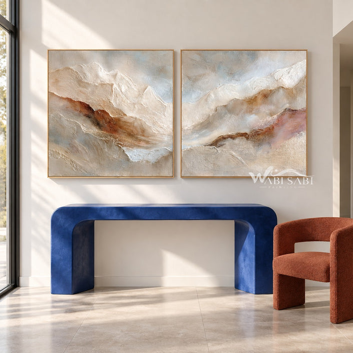 Cream and Rust Mountain Ridge Diptych shown above a console.