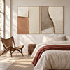 Cream and Tan Curved Texture Diptych shown in a bedroom.