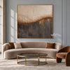 Cream Circles and Charcoal Line Abstract Wall Art shown above a curved pale sofa.