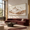 Cream Mountain Panorama with Ochre Ridges shown above a burgundy sofa.