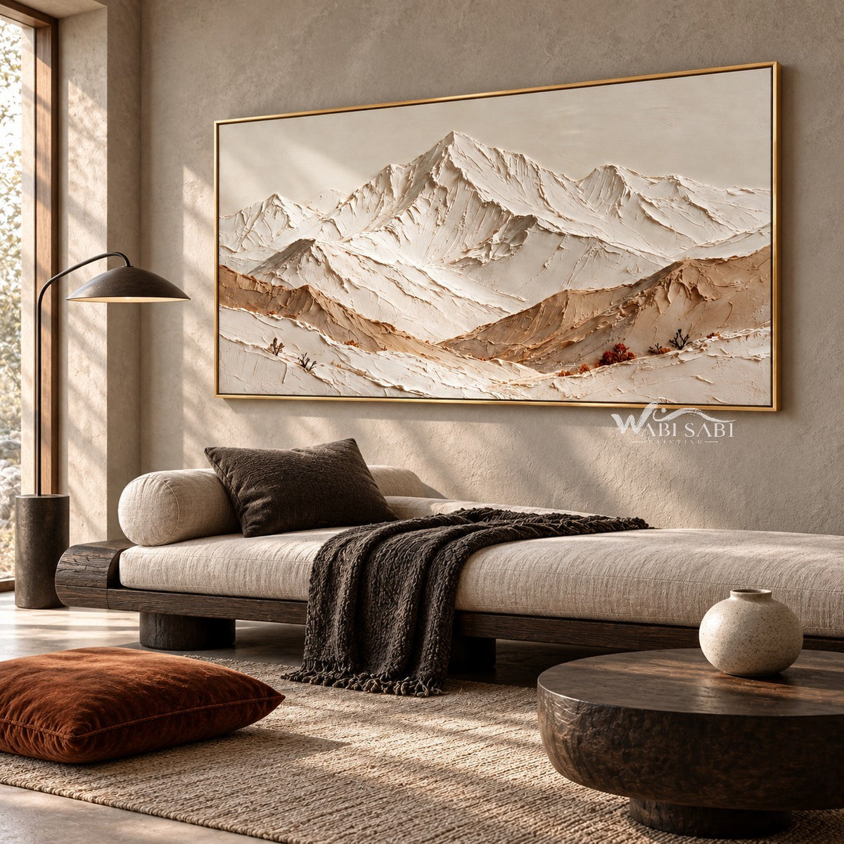 Cream Mountain Panorama with Ochre Ridges shown above a low upholstered sofa.