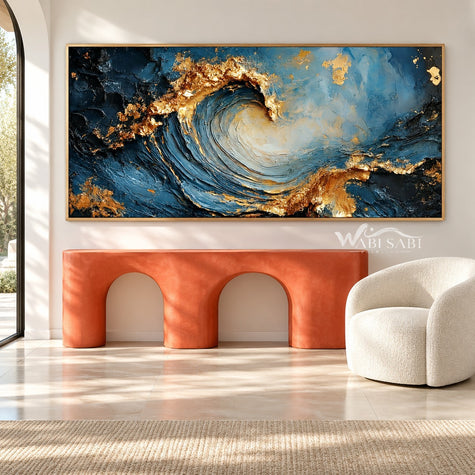 Curling Blue Wave with Gold Tone Crests Painting shown above a console.