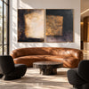 Dark Rectangle Diptych with Gold Tone Accent shown in a living room with a sofa.