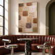Earth Tone Blocks with Diagonal Marks Painting shown in a bar area.