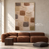 Earth Tone Blocks with Diagonal Marks Painting shown in a living room with a sofa.