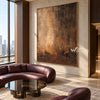 Faded Brass Abstract Wall Art shown above a sofa.