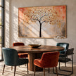 Golden Leaf Tree on a Peach Background Wall Art shown above a dining table.