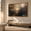 Golden Mist and Dark Landscape Wall Art shown above a long pale bench.