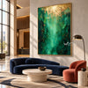 Green and Gold Color Abstract Wall Art shown above a blue sofa.
