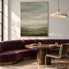 Hazy Sage Hills Landscape Painting shown in a dining area.