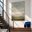 Hazy Sage Hills Landscape Painting shown beside a staircase.