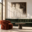 Interlocking Black and White Figures Painting shown in a living room with a sofa.