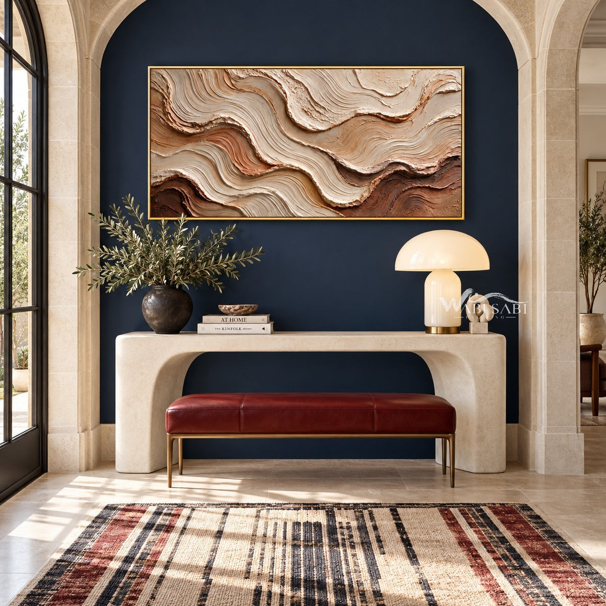 Ivory and Brown Rolling Layer Wall Art shown above a pale console and red bench.