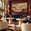 Ivory and Brown Rolling Layer Wall Art shown above a blue sofa.
