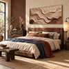 Ivory and Brown Rolling Layer Wall Art shown above a bed with a blue throw.