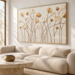 Ivory and Gold Wildflower Stems shown above a sofa.