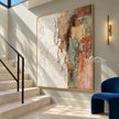 Ivory and Terracotta Broken Block Painting shown beside a staircase.