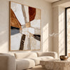 Ivory Crossroads Geometric Painting shown above a sofa.