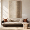 Ivory Half Circle and Bar Texture Painting shown in a living room with a sofa.