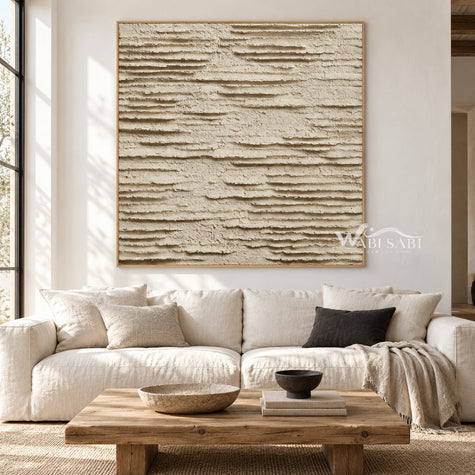 Ivory Layered Terrain Painting shown above a sofa.