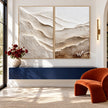 Ivory Mountain Layers Diptych Painting shown above a console.
