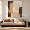 Ivory Stepped Shapes and Grooves Painting shown in a living room with a sofa.