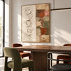 Ivory Texture and Earth Tone Blocks Wall Art shown above a dining table with green chairs.