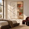 Ivory Texture and Earth Tone Blocks Wall Art shown above a bed with neutral bedding.