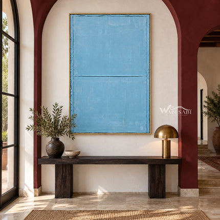 Light Blue Field with a Horizontal Line Wall Art shown above a dark console.