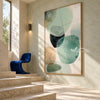 Mint Green Rounded Forms Abstract Painting shown beside a staircase.