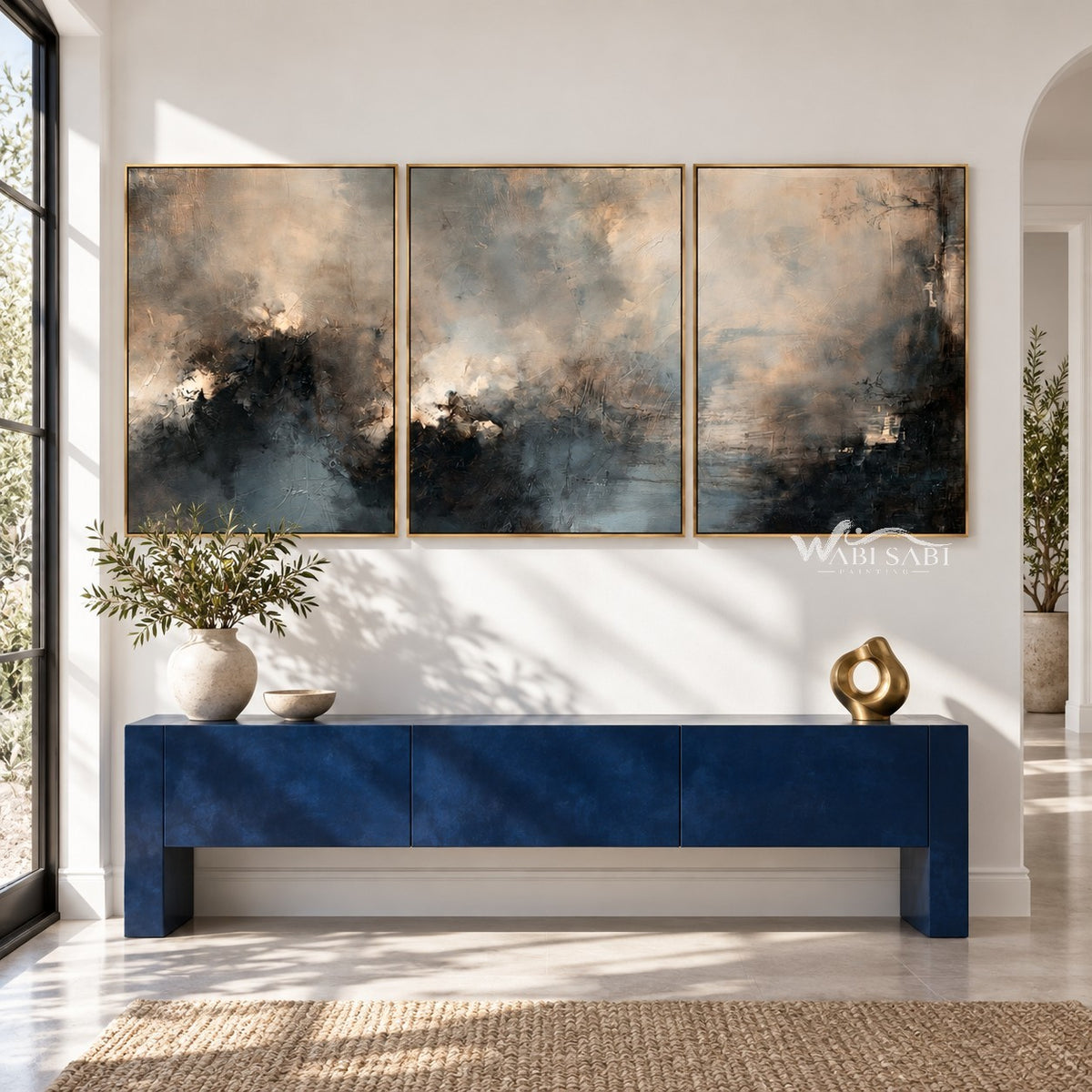 Misty Blue and Charcoal Landscape Triptych shown above a blue console.