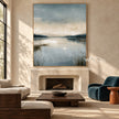 Misty Blue Lake with Reeds Wall Art shown above a fireplace.
