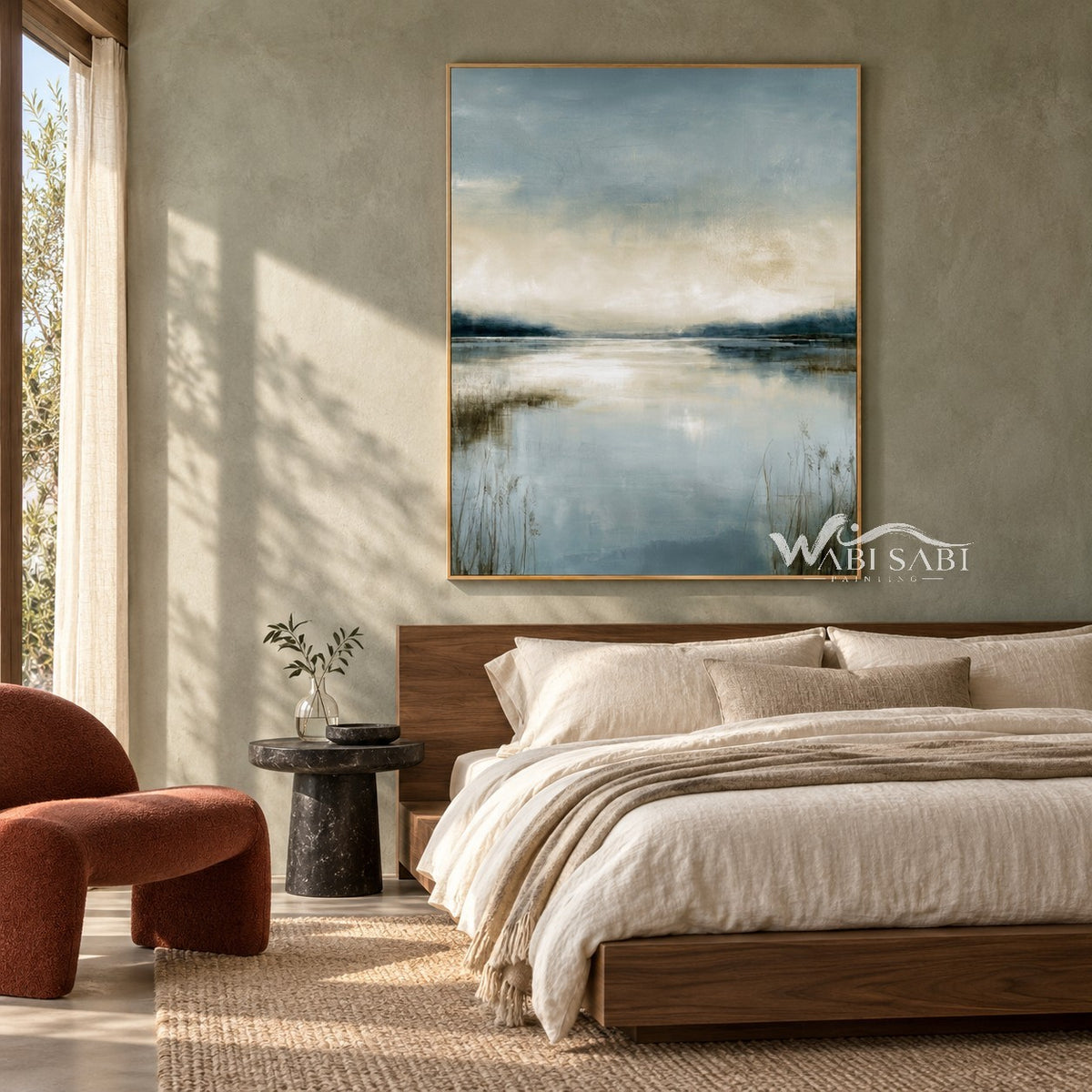 Misty Blue Lake with Reeds Wall Art shown above a bed with neutral bedding.