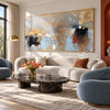 Muted Blue and Ochre Geometric Wall Art shown in a living room with a sofa.
