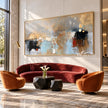 Muted Blue and Ochre Geometric Wall Art shown in a living room with a sofa.