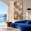 Narrow Stacked Neutral Blocks Wall Art shown in a poolside interior.