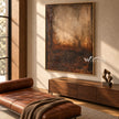 Ochre Afterglow Textured Painting shown in a seating area.