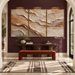 Ochre and Ivory Strata Triptych Wall Art shown above a console and bench.