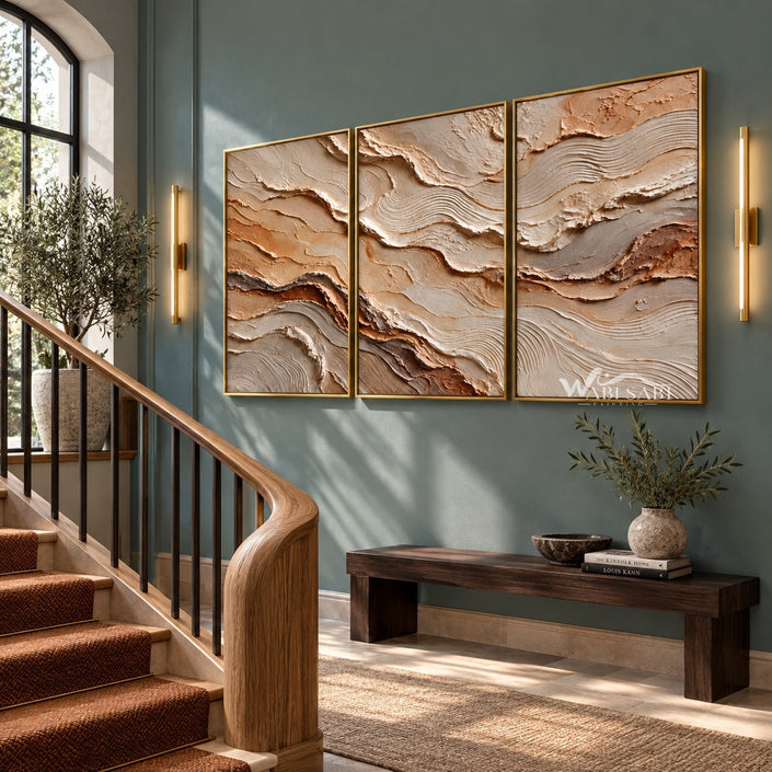 Ochre and Ivory Strata Triptych Wall Art shown beside a staircase.