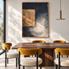 Ochre Rectangle on Charcoal Abstract Painting shown in a dining area.